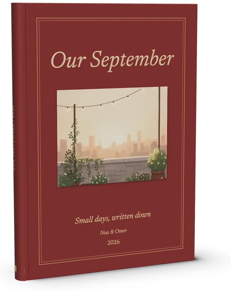 A bordeaux A5 hardcover titled Our September, standing